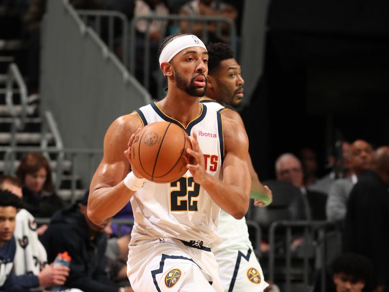 CHARLOTTE, NC - FEBRUARY 1: Zeke Nnaji #22 of the Denver Nuggets handles the ball during the game against the Charlotte Hornets on February 1, 2025 at Spectrum Center in Charlotte, North Carolina. NOTE TO USER: User expressly acknowledges and agrees that, by downloading and or using this photograph, User is consenting to the terms and conditions of the Getty Images License Agreement. Mandatory Copyright Notice: Copyright 2025 NBAE (Photo by Kent Smith/NBAE via Getty Images)