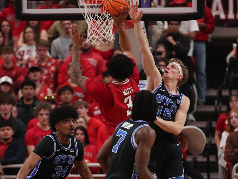 Jan 17, 2026; Lubbock, Texas, USA;  Texas Tech Red Raiders forward LeJuan Watts (3) shoots over BYU Cougars guard Richie Saunders (15) in the first half at United Supermarkets Arena. Mandatory Credit: Michael C. Johnson-Imagn Images