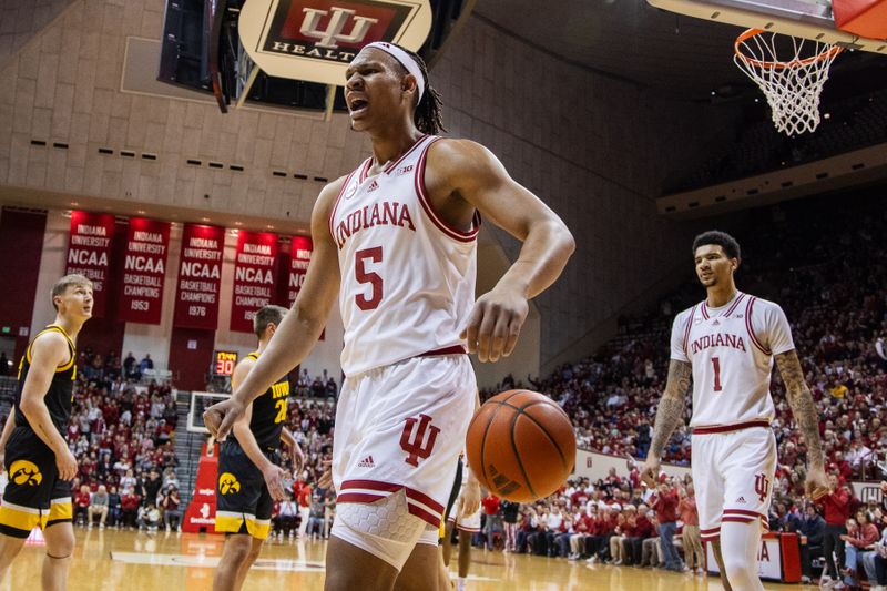 Jan 30, 2024; Bloomington, Indiana, USA; Indiana Hoosiers forward Malik Reneau (5) reacts to a basket in the first half against the Iowa Hawkeyes at Simon Skjodt Assembly Hall. Mandatory Credit: Trevor Ruszkowski-USA TODAY Sports