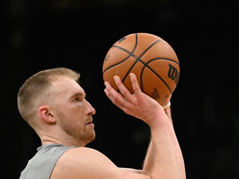 BOSTON, MASSACHUSETTS - JANUARY 29: Sam Hauser #30 of the Boston Celtics takes a shot before a game against the New Orleans Pelicans at the TD Garden on January 29, 2024 in Boston, Massachusetts. NOTE TO USER: User expressly acknowledges and agrees that, by downloading and or using this photograph, User is consenting to the terms and conditions of the Getty Images License Agreement. (Photo by Brian Fluharty/Getty Images)