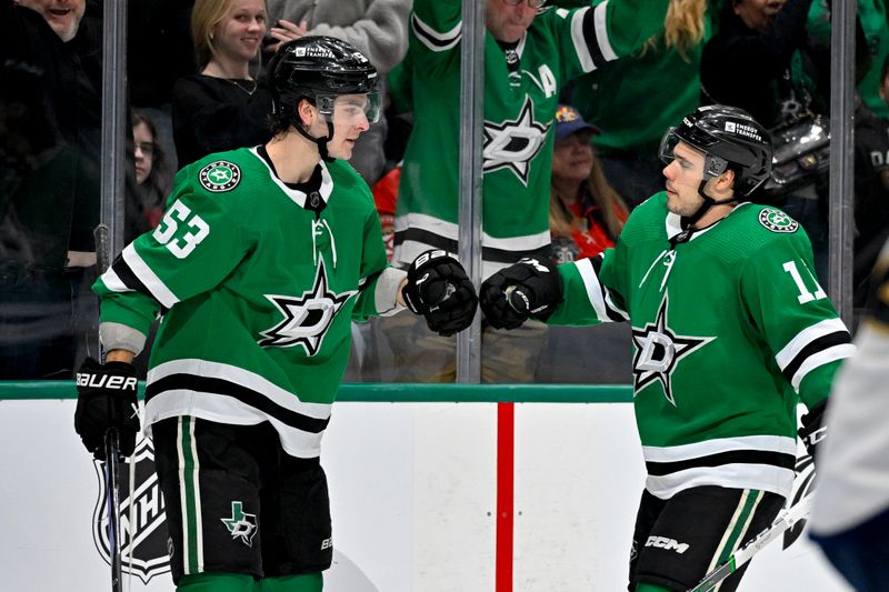 Mar 12, 2024; Dallas, Texas, USA; Dallas Stars center Wyatt Johnston (53) and center Logan Stankoven (11) celebrates a goal scored by Johnston against the Florida Panthers during the second period at the American Airlines Center. Mandatory Credit: Jerome Miron-USA TODAY Sports