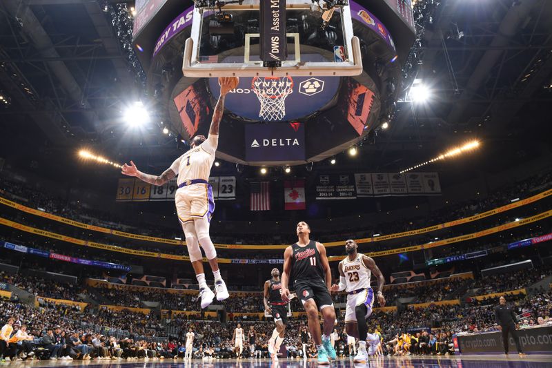 LOS ANGELES, CA - JANUARY 21:  D'Angelo Russell #1 of the Los Angeles Lakers goes to the basket during the game on January 21, 2024 at Crypto.Com Arena in Los Angeles, California. NOTE TO USER: User expressly acknowledges and agrees that, by downloading and/or using this Photograph, user is consenting to the terms and conditions of the Getty Images License Agreement. Mandatory Copyright Notice: Copyright 2024 NBAE (Photo by Juan Ocampo/NBAE via Getty Images)