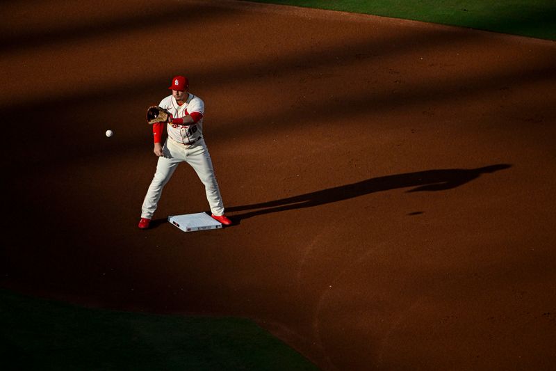 Aug 5, 2023; St. Louis, Missouri, USA;  St. Louis Cardinals second baseman Nolan Gorman (16) catches a throw before the start of the first inning against the Colorado Rockies at Busch Stadium. Mandatory Credit: Jeff Curry-USA TODAY Sports