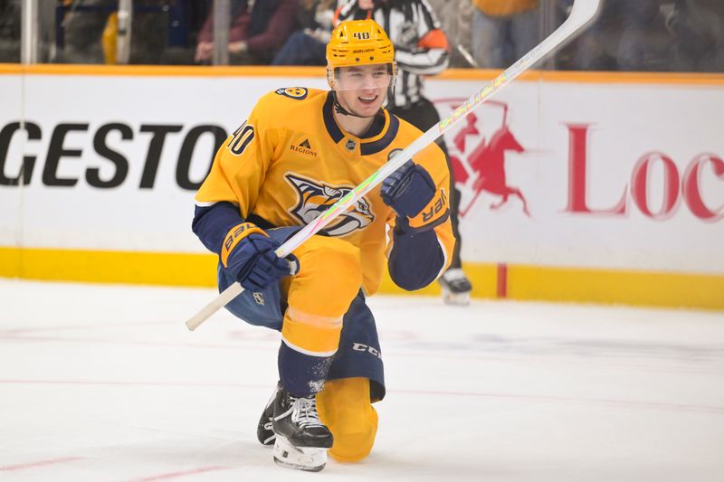 Nov 24, 2025; Nashville, Tennessee, USA;  Nashville Predators center Fedor Svechkiv (40) celebrates his goal against the Florida Panthers during the first period at Bridgestone Arena. Mandatory Credit: Steve Roberts-Imagn Images