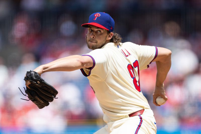 May 8, 2024; Philadelphia, Pennsylvania, USA; Philadelphia Phillies pitcher Aaron Nola (27) throws a pitch during the second inning against the Toronto Blue Jays at Citizens Bank Park. Mandatory Credit: Bill Streicher-USA TODAY Sports