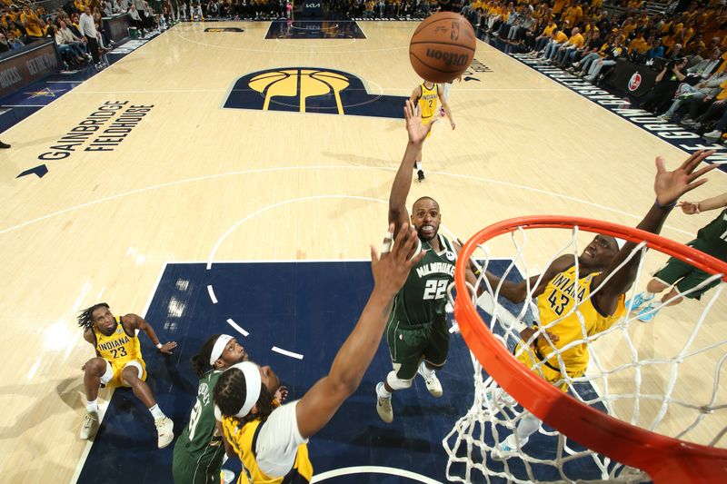 INDIANAPOLIS, IN - APRIL 26: Khris Middleton #22 of the Milwaukee Bucks shoots the ball during the game against the Indiana Pacers during Round 1 Game 3 of the 2024 NBA Playoffs on April 26, 2024 at Gainbridge Fieldhouse in Indianapolis, Indiana. NOTE TO USER: User expressly acknowledges and agrees that, by downloading and or using this Photograph, user is consenting to the terms and conditions of the Getty Images License Agreement. Mandatory Copyright Notice: Copyright 2023 NBAE (Photo by Nathaniel S. Butler/NBAE via Getty Images)