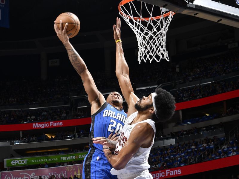 ORLANDO, FL - APRIL 27: Markelle Fultz #20 of the Orlando Magic drives to the basket during the game against the Cleveland Cavaliers during Round 1 Game 4 of the 2024 NBA Playoffs on April 27, 2024 at the Kia Center in Orlando, Florida. NOTE TO USER: User expressly acknowledges and agrees that, by downloading and or using this photograph, User is consenting to the terms and conditions of the Getty Images License Agreement. Mandatory Copyright Notice: Copyright 2024 NBAE (Photo by Fernando Medina/NBAE via Getty Images)