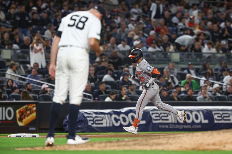 Sep 24, 2024; Bronx, New York, USA; Baltimore Orioles third baseman Ramon Urias (29) runs the bases after his solo home run during the seventh inning against New York Yankees relief pitcher Tim Mayza (58) at Yankee Stadium. Mandatory Credit: Vincent Carchietta-Imagn Images