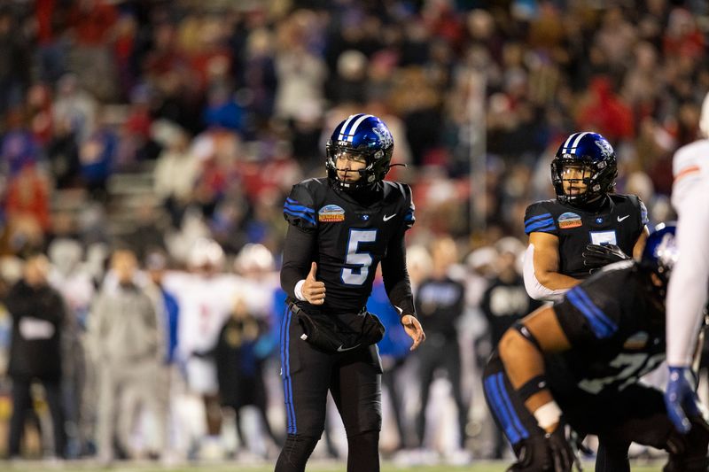 Dec 17, 2022; Albuquerque, New Mexico, USA; Brigham Young Cougars quarterback Sol-Jay Maiava-Peters (5) reacts as he faces the Southern Methodist Mustangs defense during the first half at University Stadium (Albuquerque). Mandatory Credit: Ivan Pierre Aguirre-USA TODAY Sports