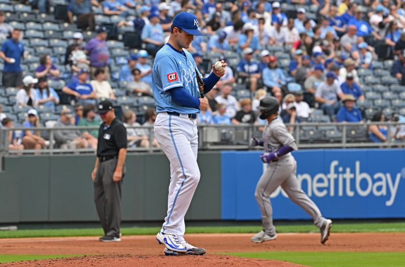 Apr 24, 2025; Kansas City, Missouri, USA;  Kansas City Royals starting pitcher Cole Ragans (55) reacts after giving up a two-run home run to Colorado Rockies Hunter Goodman (left) in the third inning at Kauffman Stadium. Mandatory Credit: Peter Aiken-Imagn Images