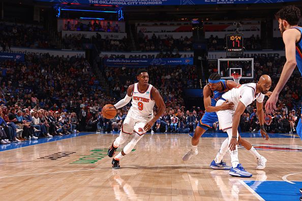 OKLAHOMA CITY, OK - DECEMBER 27: RJ Barrett #9 of the New York Knicks dribbles the ball during the game against the Oklahoma City Thunder on December 27, 2023 at Paycom Arena in Oklahoma City, Oklahoma. NOTE TO USER: User expressly acknowledges and agrees that, by downloading and or using this photograph, User is consenting to the terms and conditions of the Getty Images License Agreement. Mandatory Copyright Notice: Copyright 2023 NBAE (Photo by Zach Beeker/NBAE via Getty Images)