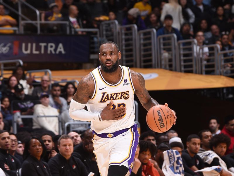 LOS ANGELES, CA - JANUARY 21:  LeBron James #23 of the Los Angeles Lakers handles the ball during the game on January 21, 2024 at Crypto.Com Arena in Los Angeles, California. NOTE TO USER: User expressly acknowledges and agrees that, by downloading and/or using this Photograph, user is consenting to the terms and conditions of the Getty Images License Agreement. Mandatory Copyright Notice: Copyright 2024 NBAE (Photo by Juan Ocampo/NBAE via Getty Images)