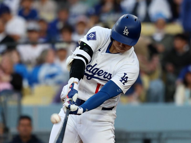 Jun 1, 2024; Los Angeles, California, USA;  Los Angeles Dodgers designated hitter Shohei Ohtani (17) flies out to left during the first inning against the Colorado Rockies at Dodger Stadium. Mandatory Credit: Kiyoshi Mio-USA TODAY Sports