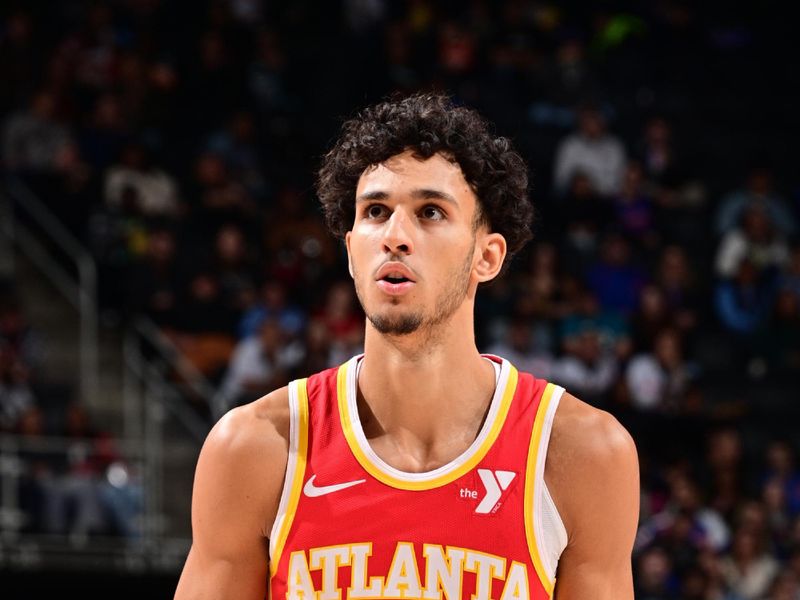 DETROIT, MI - NOVEMBER 8: Zaccharie Risacher #10 of the Atlanta Hawks shoots a free throw during the game against the Detroit Pistons on November  8, 2024 at Little Caesars Arena in Detroit, Michigan. NOTE TO USER: User expressly acknowledges and agrees that, by downloading and/or using this photograph, User is consenting to the terms and conditions of the Getty Images License Agreement. Mandatory Copyright Notice: Copyright 2024 NBAE (Photo by Chris Schwegler/NBAE via Getty Images)