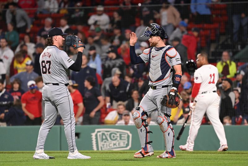 May 30, 2024; Boston, Massachusetts, USA; Detroit Tigers pitcher Tyler Holton (87) and catcher Carson Kelly (15) celebrate defeating the Boston Red Sox at Fenway Park. Mandatory Credit: Eric Canha-USA TODAY Sports