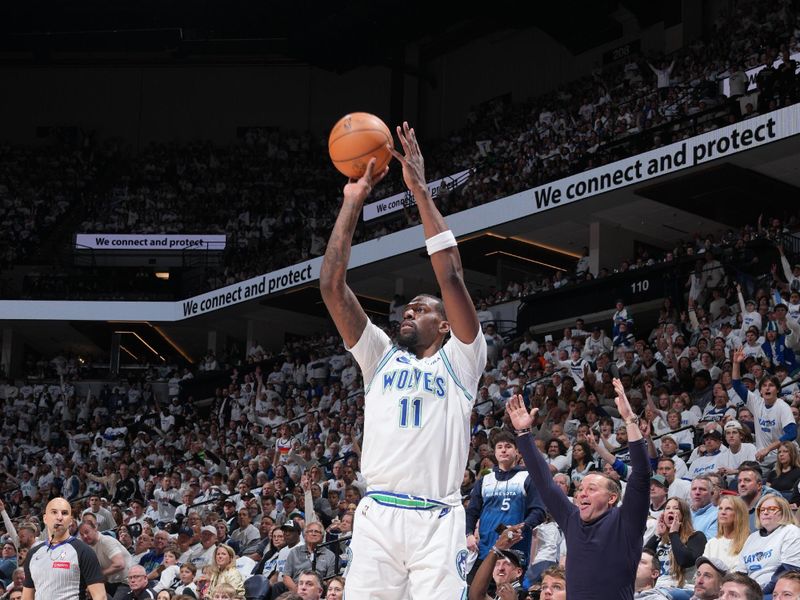 MINNEAPOLIS, MN -  APRIL 20: Naz Reid #11 of the Minnesota Timberwolves shoots the ball during Round One Game One of the 2024 NBA Playoffs against the Phoenix Suns on April 20, 2024 at Target Center in Minneapolis, Minnesota. NOTE TO USER: User expressly acknowledges and agrees that, by downloading and or using this Photograph, user is consenting to the terms and conditions of the Getty Images License Agreement. Mandatory Copyright Notice: Copyright 2024 NBAE (Photo by Jordan Johnson/NBAE via Getty Images)