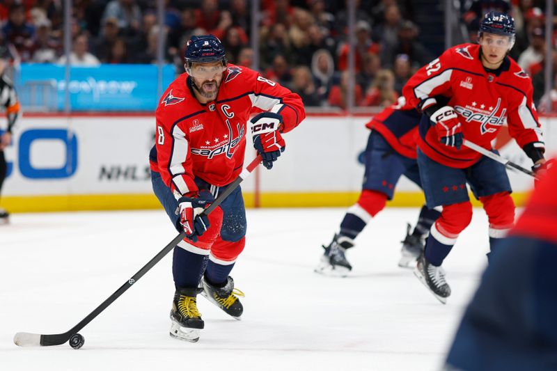 Feb 13, 2024; Washington, District of Columbia, USA; Washington Capitals left wing Alex Ovechkin (8) passes the puck against the Colorado Avalanche in the second period at Capital One Arena. Mandatory Credit: Geoff Burke-USA TODAY Sports