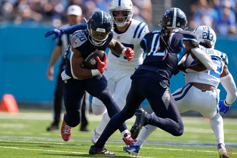 Tennessee Titans running back Tony Pollard (20) runs during the first half of an NFL football game against the Indianapolis Colts, Sunday, Oct. 13, 2024, in Nashville, Tenn. (AP Photo/George Walker IV)