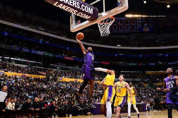 LOS ANGELES, CA - NOVEMBER 15: Malik Monk #0 of the Sacramento Kings dunks the ball during the game against the Los Angeles Lakers on November 15, 2023 at Crypto.Com Arena in Los Angeles, California. NOTE TO USER: User expressly acknowledges and agrees that, by downloading and/or using this Photograph, user is consenting to the terms and conditions of the Getty Images License Agreement. Mandatory Copyright Notice: Copyright 2023 NBAE (Photo by Adam Pantozzi/NBAE via Getty Images)