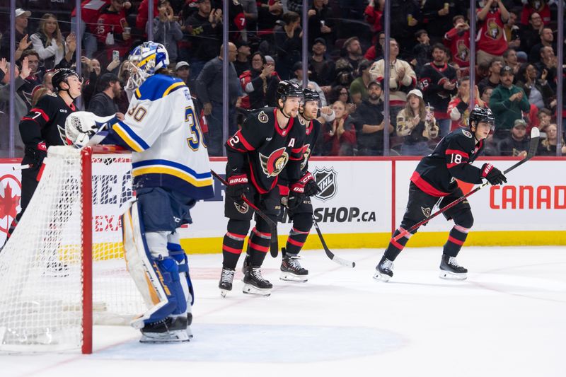 Oct 29, 2024; Ottawa, Ontario, CAN; Ottawa Senators center Tim Stutzle (18) skates to the bench after scoring a goal against St. Louis Blues goalie Jordan Binnington (30) in the first period at the Canadian Tire Centre. Mandatory Credit: Marc DesRosiers-Imagn Images