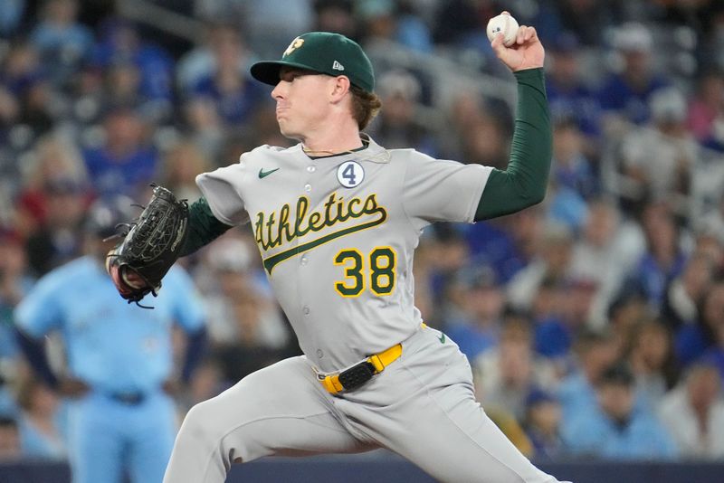 Jun 1, 2025; Toronto, Ontario, CAN; Oakland Athletics starting pitcher JP Sears (38) pitches to the Toronto Blue Jays during the first inning at Rogers Centre. Mandatory Credit: John E. Sokolowski-Imagn Images