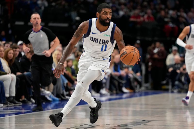 DALLAS, TEXAS - JANUARY 09: Kyrie Irving #11 of the Dallas Mavericks controls the ball during the first half against the Memphis Grizzlies at American Airlines Center on January 09, 2024 in Dallas, Texas. NOTE TO USER: User expressly acknowledges and agrees that, by downloading and or using this photograph, User is consenting to the terms and conditions of the Getty Images License Agreement. (Photo by Sam Hodde/Getty Images)