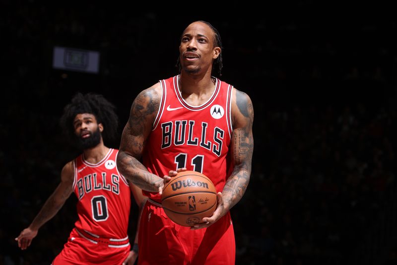 BROOKLYN, NY - MARCH 29: DeMar DeRozan #11 of the Chicago Bulls shoots a free throw during the game against the Brooklyn Nets on March 29, 2024 at Barclays Center in Brooklyn, New York. NOTE TO USER: User expressly acknowledges and agrees that, by downloading and or using this Photograph, user is consenting to the terms and conditions of the Getty Images License Agreement. Mandatory Copyright Notice: Copyright 2024 NBAE (Photo by Nathaniel S. Butler/NBAE via Getty Images)