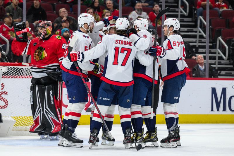 Dec 10, 2023; Chicago, Illinois, USA; Washington Capitals center Dylan Strome (17) celebrates his goal with teammates against the Chicago Blackhawks during the second period at the United Center. Mandatory Credit: Daniel Bartel-USA TODAY Sports