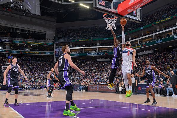 SACRAMENTO, CA - DECEMBER 18: Tyus Jones #5 of the Washington Wizards drives to the basket during the game against the Sacramento Kings on December 18, 2023 at Golden 1 Center in Sacramento, California. NOTE TO USER: User expressly acknowledges and agrees that, by downloading and or using this Photograph, user is consenting to the terms and conditions of the Getty Images License Agreement. Mandatory Copyright Notice: Copyright 2023 NBAE (Photo by Rocky Widner/NBAE via Getty Images)