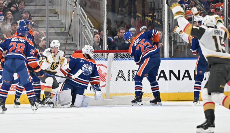 Dec 21, 2025; Edmonton, Alberta, CAN; Vegas Golden Knights right winger Mich Marnewr (93) celebrates a goal on Edmonton Oilers goalie Connor Ingram (39) as Oilers defenseman Darnell Nurse (25) looks on during the third period at Rogers Place. Mandatory Credit: Walter Tychnowicz-Imagn Images