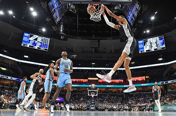 MEMPHIS, TENNESSEE - JANUARY 02: Victor Wembanyama #1 of the San Antonio Spurs goes to the basket during the game against the Memphis Grizzlies at FedExForum on January 02, 2024 in Memphis, Tennessee. NOTE TO USER: User expressly acknowledges and agrees that, by downloading and or using this photograph, User is consenting to the terms and conditions of the Getty Images License Agreement. (Photo by Justin Ford/Getty Images)