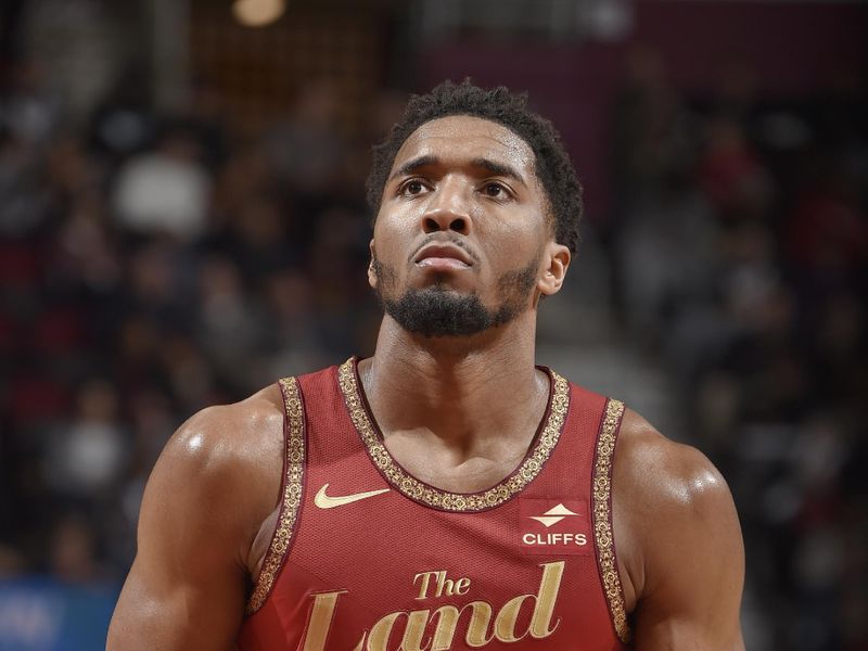 CLEVELAND, OH - JANUARY 29: Donovan Mitchell #45 of the Cleveland Cavaliers shoots a free throw during the game against the LA Clippers on January 29, 2024 at Rocket Mortgage FieldHouse in Cleveland, Ohio. NOTE TO USER: User expressly acknowledges and agrees that, by downloading and/or using this Photograph, user is consenting to the terms and conditions of the Getty Images License Agreement. Mandatory Copyright Notice: Copyright 2024 NBAE (Photo by David Liam Kyle/NBAE via Getty Images)