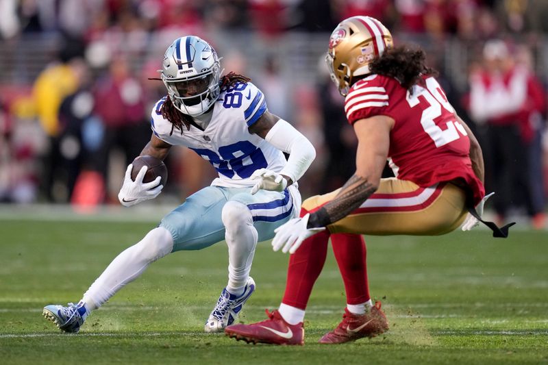 Dallas Cowboys wide receiver CeeDee Lamb (88) runs against San Francisco 49ers safety Talanoa Hufanga (29) during the first half of an NFL divisional round playoff football game in Santa Clara, Calif., Sunday, Jan. 22, 2023. (AP Photo/Godofredo A. Vásquez)