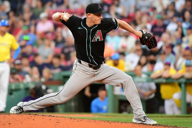 Aug 24, 2024; Boston, Massachusetts, USA;  Arizona Diamondbacks relief pitcher Paul Sewald (38) pitches during the ninth inning against the Boston Red Sox at Fenway Park. Mandatory Credit: Bob DeChiara-USA TODAY Sports