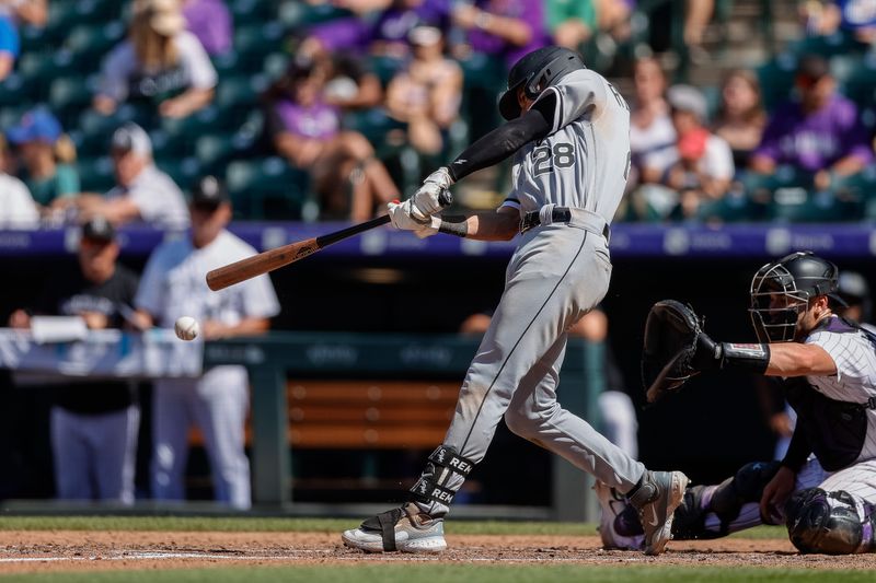 Aug 20, 2023; Denver, Colorado, USA; Chicago White Sox second baseman Zach Remillard (28) this an RBI double in the seventh inning against the Colorado Rockies at Coors Field. Mandatory Credit: Isaiah J. Downing-USA TODAY Sports