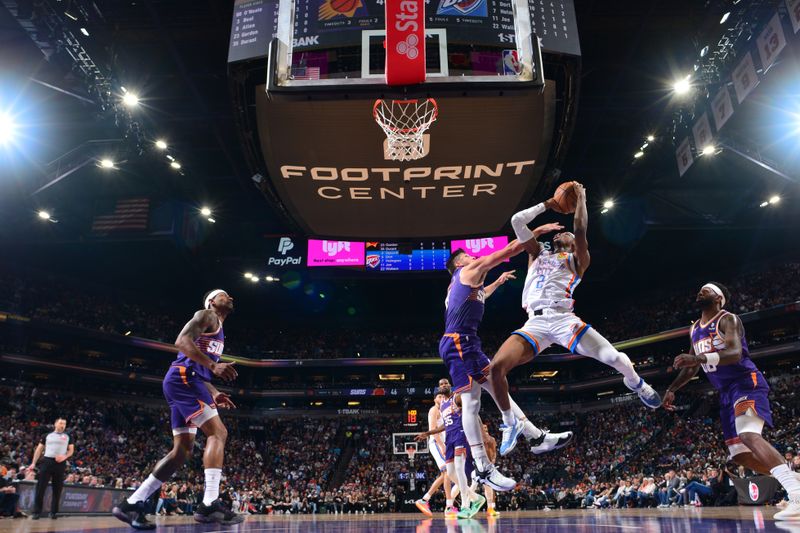 PHOENIX, AZ - MARCH 3:  Shai Gilgeous-Alexander #2 of the Oklahoma City Thunder goes to the basket during the game on March 3, 2024 at Footprint Center in Phoenix, Arizona. NOTE TO USER: User expressly acknowledges and agrees that, by downloading and or using this photograph, user is consenting to the terms and conditions of the Getty Images License Agreement. Mandatory Copyright Notice: Copyright 2024 NBAE (Photo by Kate Frese/NBAE via Getty Images)