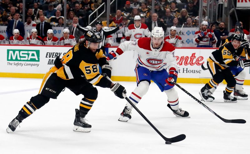 Jan 27, 2024; Pittsburgh, Pennsylvania, USA;  Pittsburgh Penguins defenseman Kris Letang (58) skates with the puck against the Montreal Canadiens during the third period at PPG Paints Arena. The Penguins won 3-2 in overtime. Mandatory Credit: Charles LeClaire-USA TODAY Sports