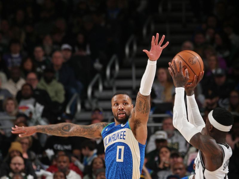 MILWAUKEE, WI - MARCH 21: Damian Lillard #0 of the Milwaukee Bucks plays defense during the game against the Brooklyn Nets on March 21, 2024 at the Fiserv Forum Center in Milwaukee, Wisconsin. NOTE TO USER: User expressly acknowledges and agrees that, by downloading and or using this Photograph, user is consenting to the terms and conditions of the Getty Images License Agreement. Mandatory Copyright Notice: Copyright 2024 NBAE (Photo by Gary Dineen/NBAE via Getty Images).