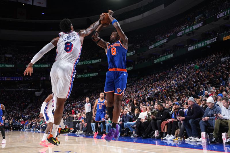 PHILADELPHIA, PA - JANUARY 15: Paul George #8 of the Philadelphia 76ers blocks a shot during the game against the New York Knicks on January 15, 2025 at the Wells Fargo Center in Philadelphia, Pennsylvania NOTE TO USER: User expressly acknowledges and agrees that, by downloading and/or using this Photograph, user is consenting to the terms and conditions of the Getty Images License Agreement. Mandatory Copyright Notice: Copyright 2025 NBAE (Photo by Jesse D. Garrabrant/NBAE via Getty Images)