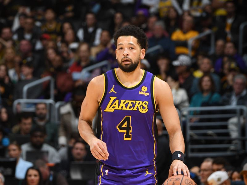 LOS ANGELES, CA - FEBRUARY 9: Skylar Mays #4 of the Los Angeles Lakers dribbles the ball during the game against the New Orleans Pelicans on February 9, 2024 at Crypto.Com Arena in Los Angeles, California. NOTE TO USER: User expressly acknowledges and agrees that, by downloading and/or using this Photograph, user is consenting to the terms and conditions of the Getty Images License Agreement. Mandatory Copyright Notice: Copyright 2024 NBAE (Photo by Andrew D. Bernstein/NBAE via Getty Images)