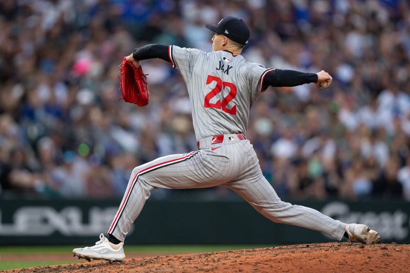 Jun 28, 2024; Seattle, Washington, USA; Minnesota Twins Griffin Jax (22) delivers a pitch during the eighth inning against the Seattle Mariners at T-Mobile Park. Mandatory Credit: Stephen Brashear-USA TODAY Sports