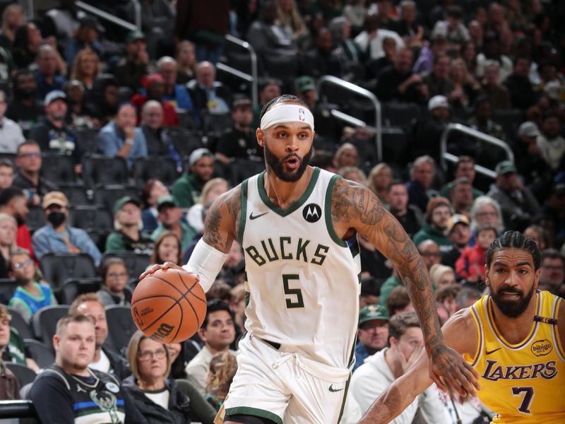 MILWAUKEE, WI - OCTOBER 10: Gary Trent Jr. #5 of the Milwaukee Bucks drives to the basket during the game against the Los Angeles Lakers during a preseason game on October 10, 2024 at Fiserv Forum Center in Milwaukee, Wisconsin. NOTE TO USER: User expressly acknowledges and agrees that, by downloading and or using this Photograph, user is consenting to the terms and conditions of the Getty Images License Agreement. Mandatory Copyright Notice: Copyright 2024 NBAE (Photo by Gary Dineen/NBAE via Getty Images).