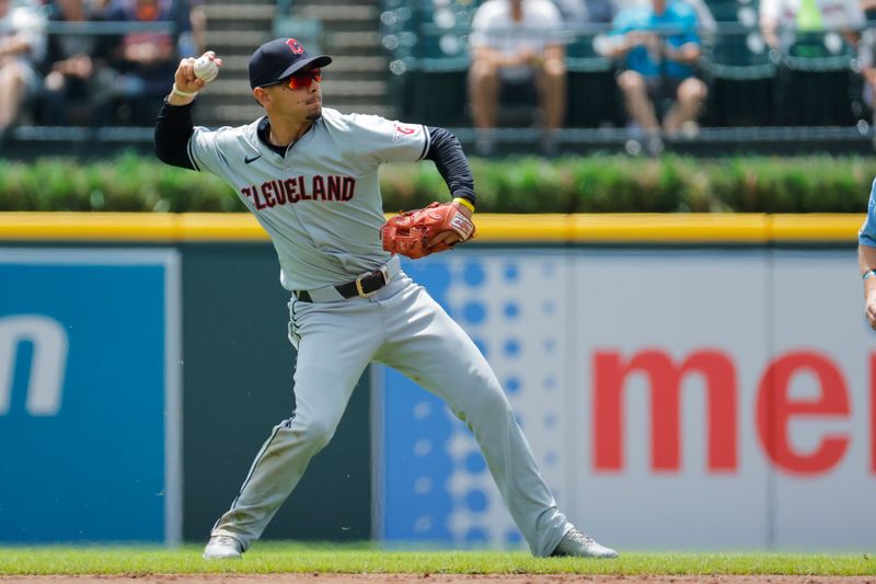 Jul 11, 2024; Detroit, Michigan, USA;  Cleveland Guardians second base Andres Gimenez (0) makes a throw in the first inning against the Detroit Tigers at Comerica Park. Mandatory Credit: Rick Osentoski-USA TODAY Sports