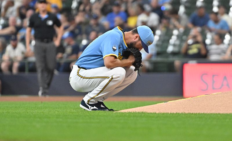 Sep 20, 2024; Milwaukee, Wisconsin, USA; Milwaukee Brewers pitcher Colin Rea (48) takes a moment before taking the mound against the Arizona Diamondbacks in the first inning at American Family Field. Mandatory Credit: Michael McLoone-Imagn Images