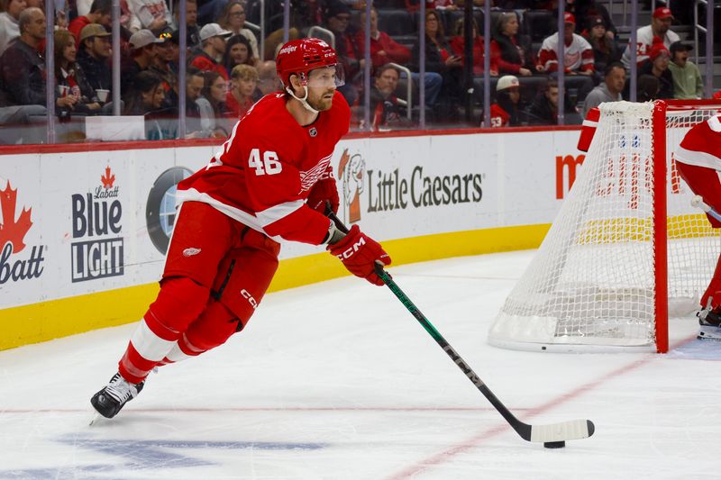 Nov 2, 2024; Detroit, Michigan, USA; Detroit Red Wings defenseman Jeff Petry (46) handles the puck during the first period of the game against the Buffalo Sabres at Little Caesars Arena. Mandatory Credit: Brian Bradshaw Sevald-Imagn Images