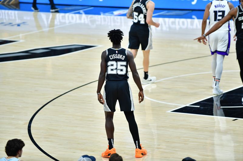 SAN ANTONIO, TX - DECEMBER 6: Sidy Cissoko #25 of the San Antonio Spurs looks on during the game against the Sacramento Kings on December 6, 2024 at the Frost Bank Center in San Antonio, Texas. NOTE TO USER: User expressly acknowledges and agrees that, by downloading and or using this photograph, user is consenting to the terms and conditions of the Getty Images License Agreement. Mandatory Copyright Notice: Copyright 2024 NBAE (Photos by Michael Gonzales/NBAE via Getty Images)