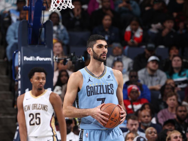 MEMPHIS, TN - NOVEMBER 29: Santi Aldama #7 of the Memphis Grizzlies looks on during the game against the New Orleans Pelicans during the Emirates NBA Cup game on November 29, 2024 at FedExForum in Memphis, Tennessee. NOTE TO USER: User expressly acknowledges and agrees that, by downloading and or using this photograph, User is consenting to the terms and conditions of the Getty Images License Agreement. Mandatory Copyright Notice: Copyright 2024 NBAE (Photo by Joe Murphy/NBAE via Getty Images)