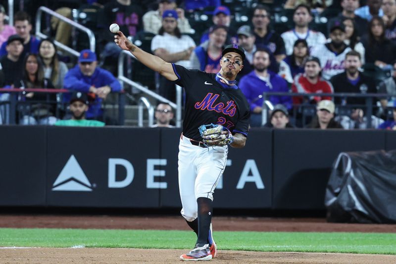 Apr 22, 2025; New York City, New York, USA;  New York Mets third baseman Mark Vientos (27) throws a runner out at first base in the ninth inning against the Philadelphia Phillies at Citi Field. Mandatory Credit: Wendell Cruz-Imagn Images