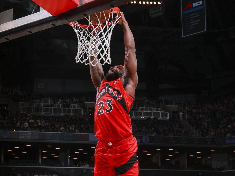 BROOKLYN, NY - OCTOBER 18: Jamal Shead #23 of the Toronto Raptors dunks the ball during the game on October 18, 2024 at Barclays Center in Brooklyn, New York. NOTE TO USER: User expressly acknowledges and agrees that, by downloading and or using this Photograph, user is consenting to the terms and conditions of the Getty Images License Agreement. Mandatory Copyright Notice: Copyright 2024 NBAE (Photo by Nathaniel S. Butler/NBAE via Getty Images)