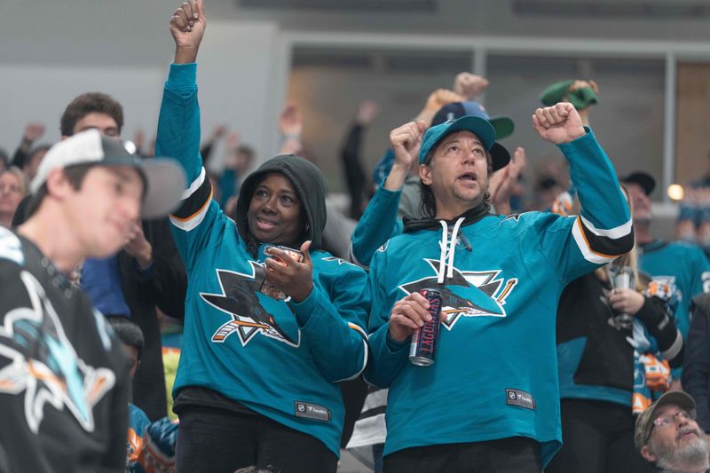 Dec 21, 2023; San Jose, California, USA; San Jose Sharks fans cheer during the second period against the Arizona Coyotes at SAP Center at San Jose. Mandatory Credit: Stan Szeto-USA TODAY Sports